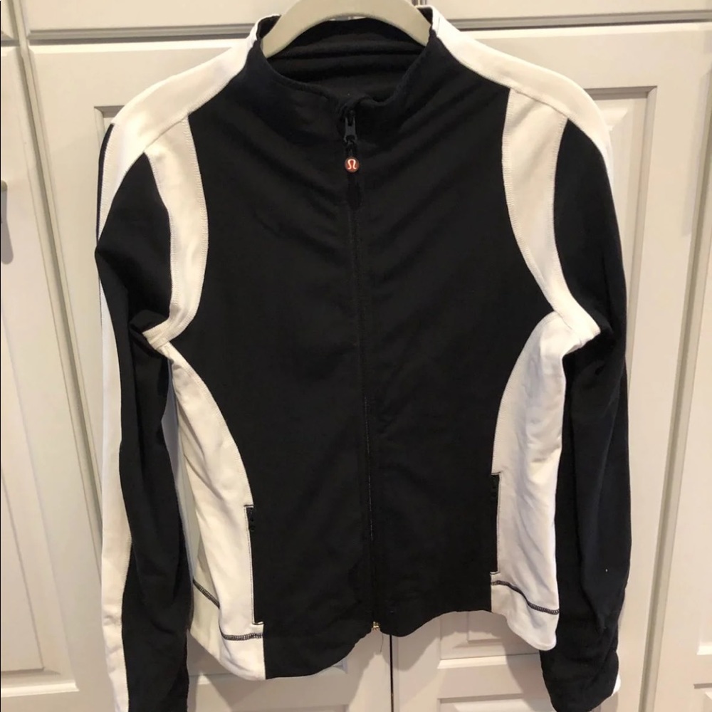 Black and white full zip jacket. Size 8. Lululemon